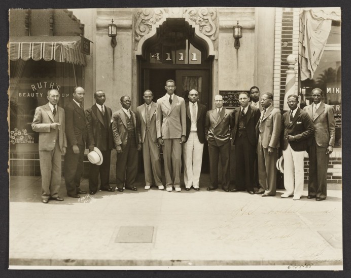 Jesse Owens visits the Home Office of the Golden State Mutual
